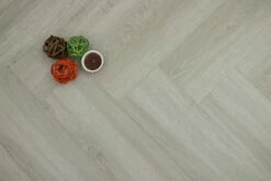 Supremo Luxury Click Vinyl Rigid Core Herringbone Flooring Graphite With Built In Underlay 6mm By 127mm By 610mm